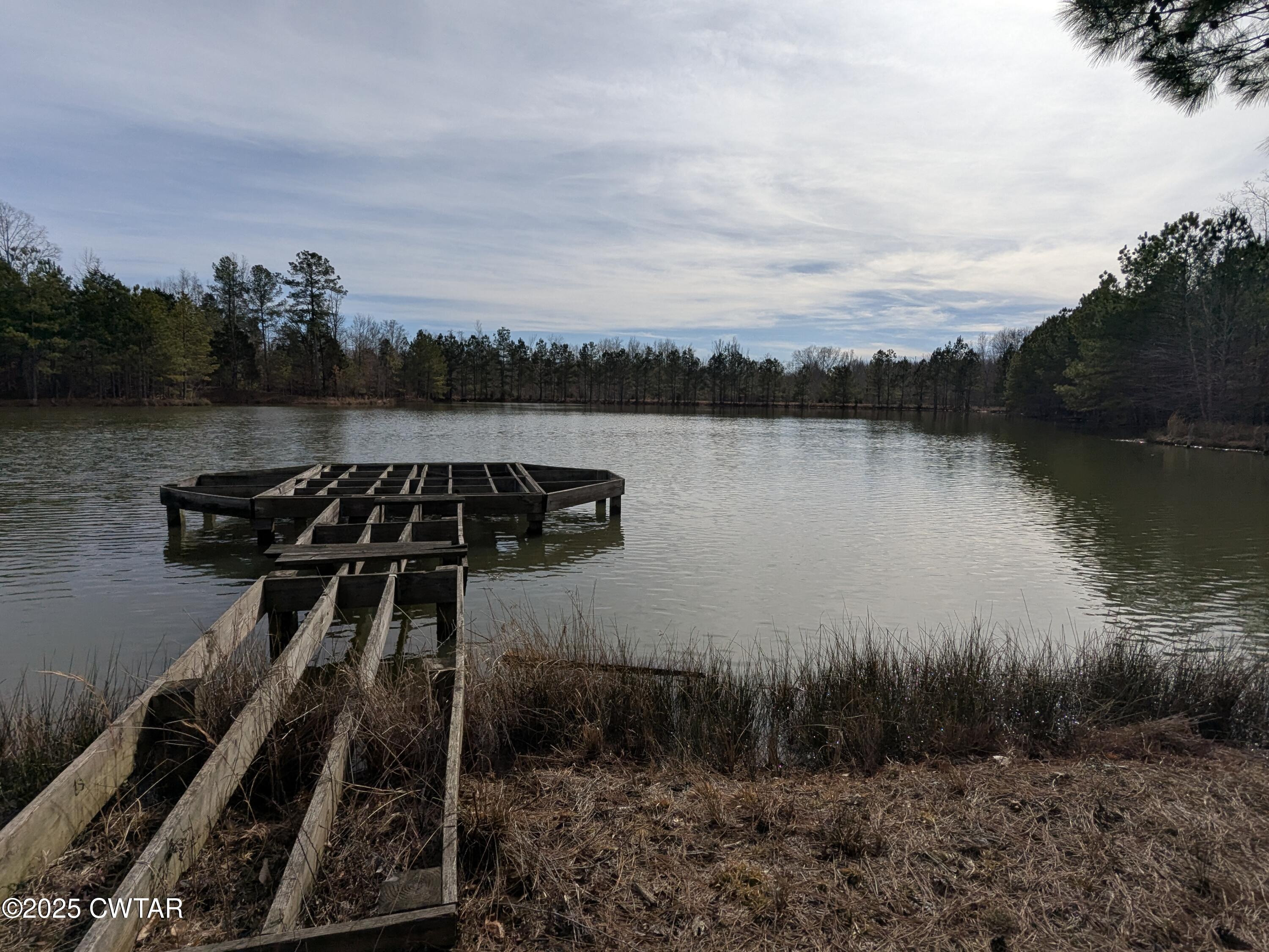 8411 Tn-69a Big Sandy, TN 38221 - Photo 2 of 10 a view of a lake