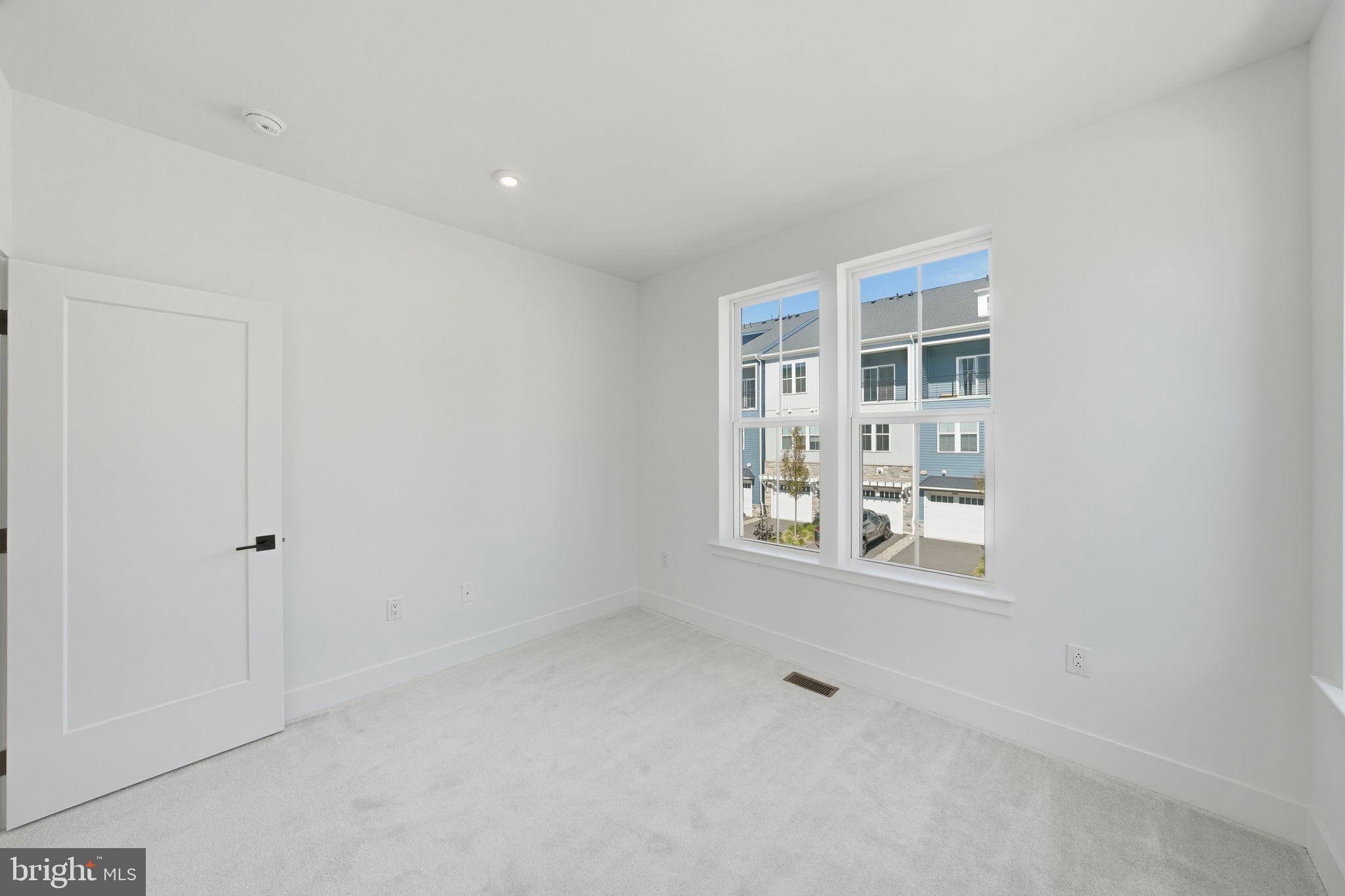 8101 Donatello Drive Princeton, NJ 08540 - Photo 15 of 26 a view of an empty room with a window