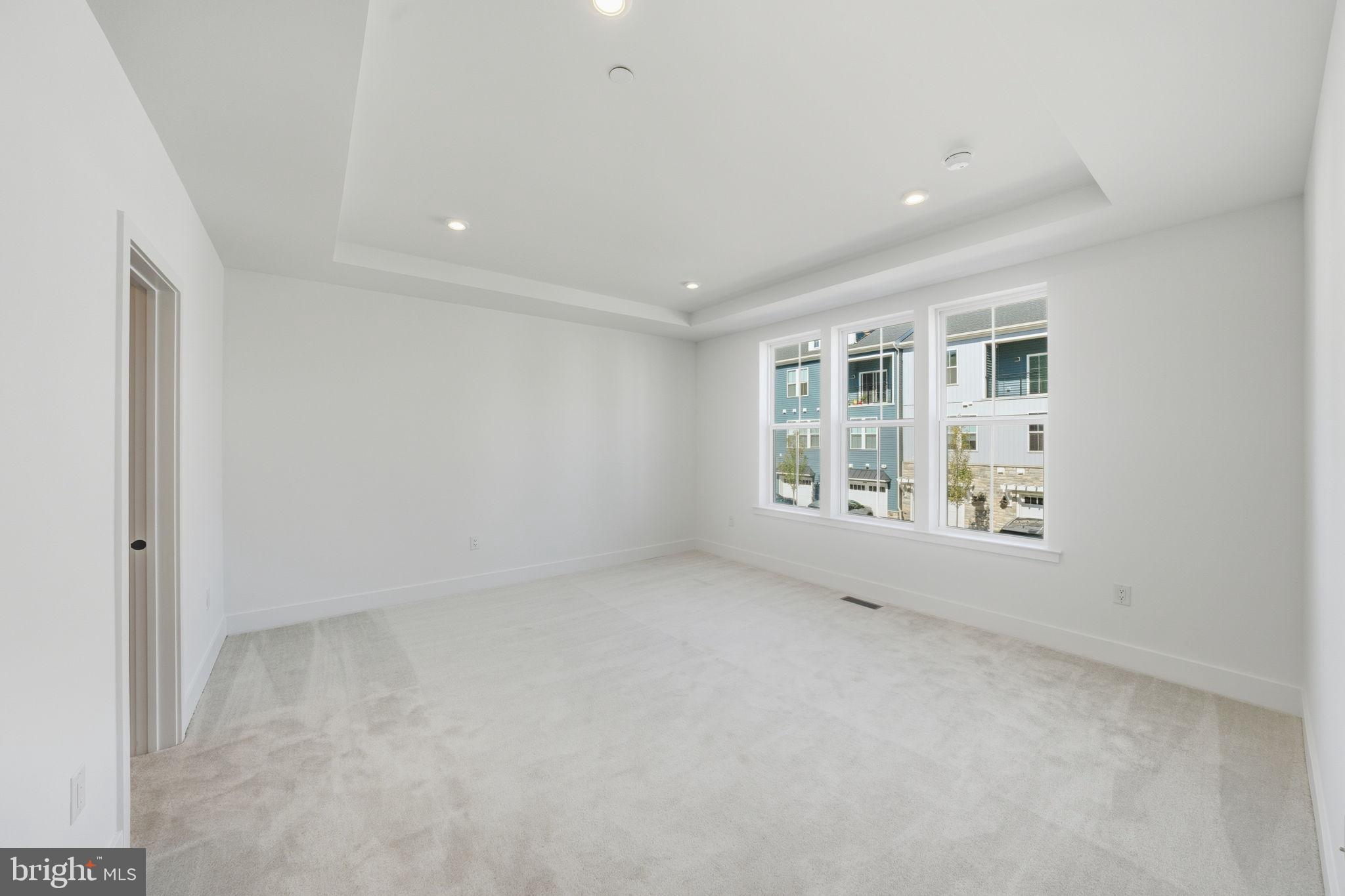 8101 Donatello Drive Princeton, NJ 08540 - Photo 18 of 26 an empty room with windows