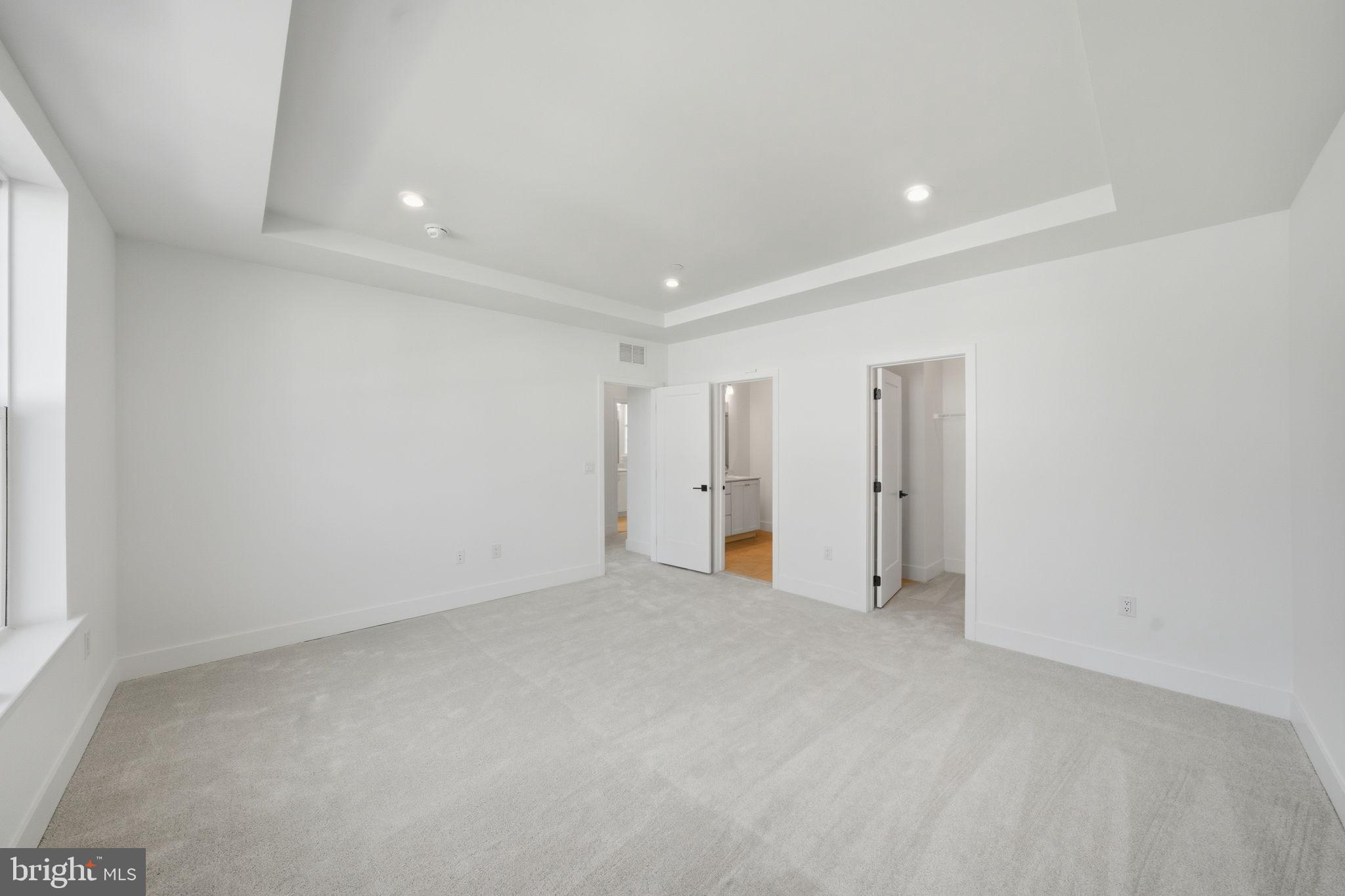 8101 Donatello Drive Princeton, NJ 08540 - Photo 20 of 26 wooden floor in an empty room with a window