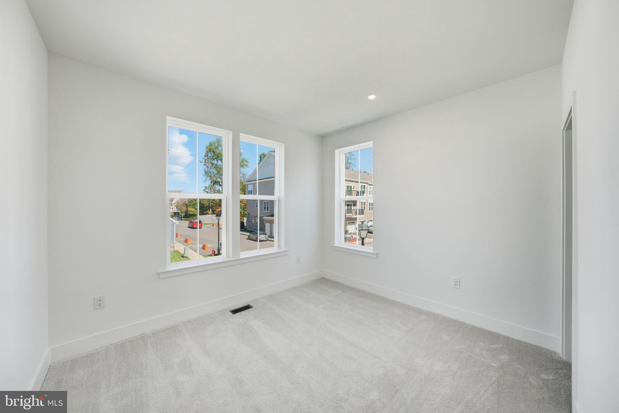 8101 Donatello Drive Princeton, NJ 08540 - Photo 25 of 26 an empty room with windows