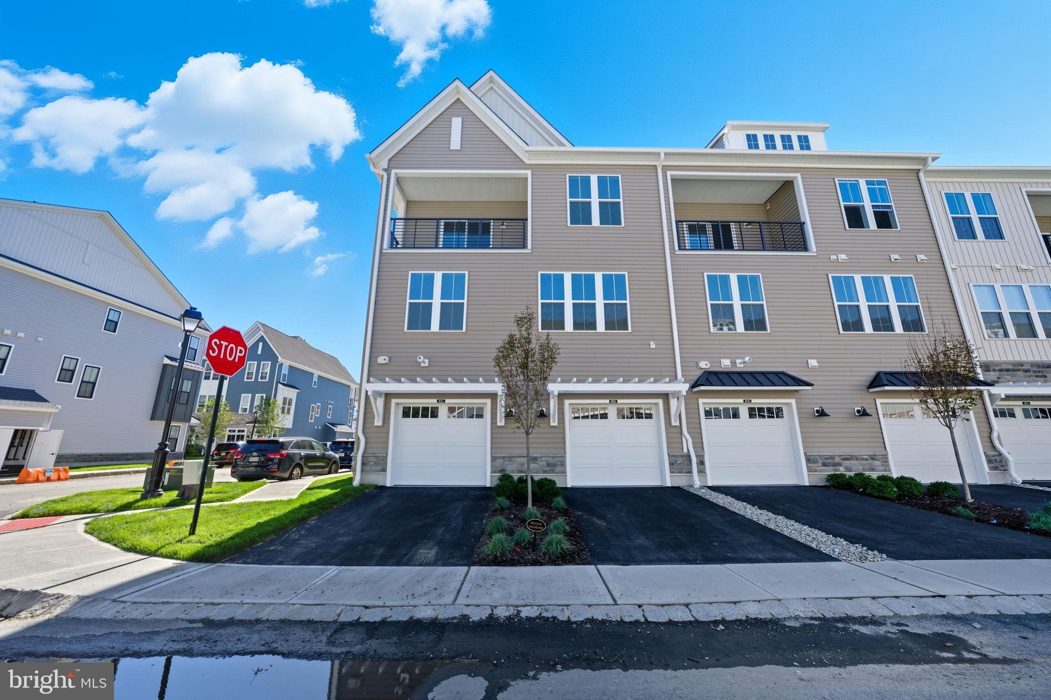 8101 Donatello Drive Princeton, NJ 08540 - Photo 5 of 26 a front view of a house with garden