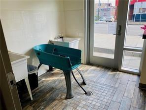 1655 Fifth Avenue, Unit 309 Pittsburgh, PA 15219 - Photo 3 of 16 a view of a workspace with furniture and a window