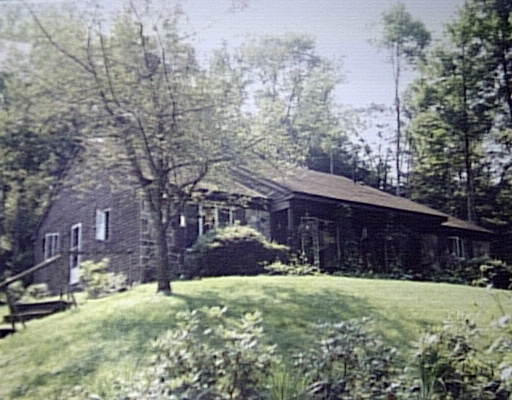14 County Road Huntington, MA 01050 - Photo 1 of 1 a view of a yard in front of a building