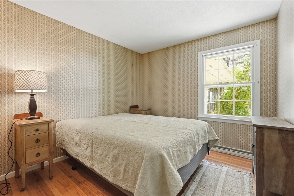 13 Cider Mill Road Leverett, MA 01054 - Photo 17 of 39 a bedroom with a bed and a window