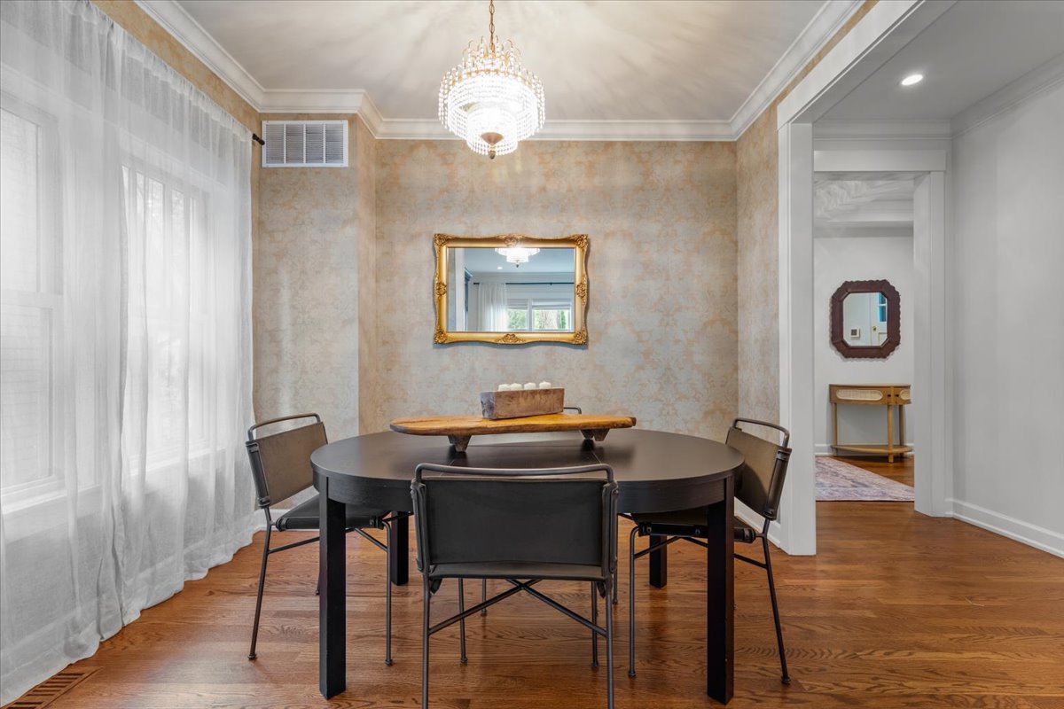 1303 Maple Avenue Wilmette, IL 60091 - Photo 12 of 33 a view of a dining room with furniture and wooden floor