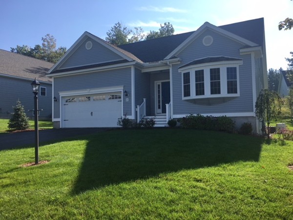 21 Quarry Road, Unit 21 Londonderry, NH 03053 - Photo 1 of 23 a house view with a garden space