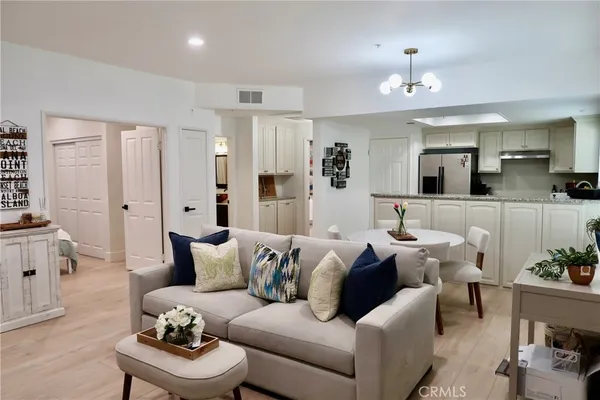 $735,000 | 4561 Warner Avenue, Unit 101, Huntington Beach, CA 92649