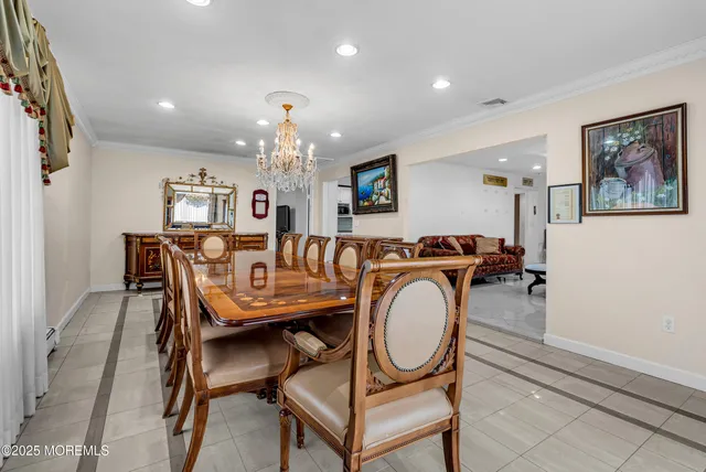 a view of a dining room with furniture