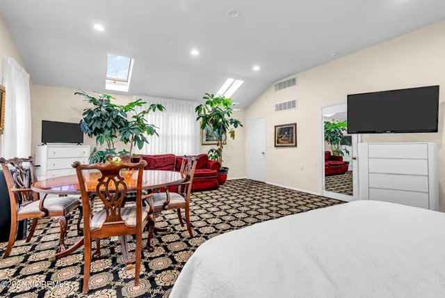 a bathroom with a glass shower door