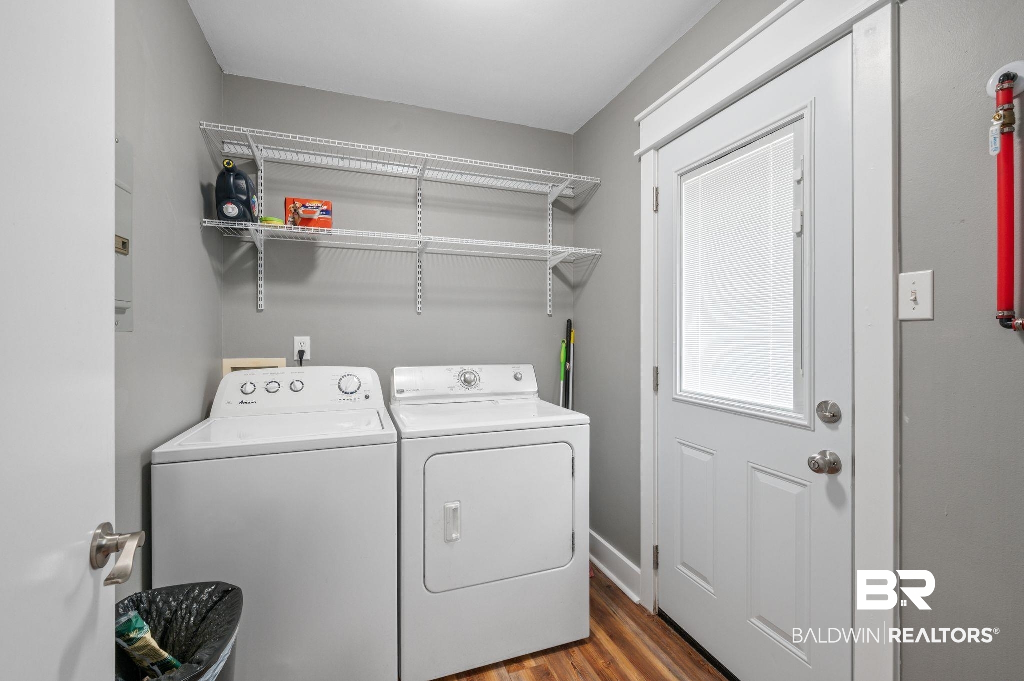 1107 North Oak Street Loxley, AL 36551 - Photo 21 of 40 Laundry area with separate washer and dryer and hardwood / wood-style floors