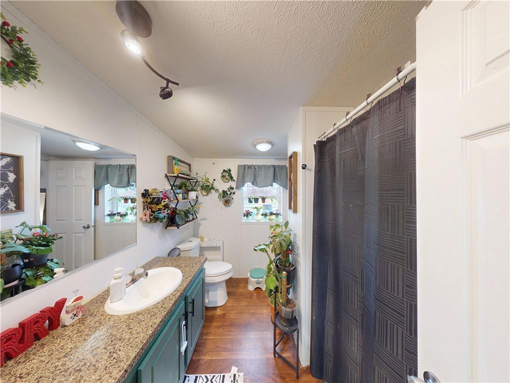 145 Boomerang Road Harrisville, PA 16038 - Photo 13 of 37 a very nice looking room with a couch