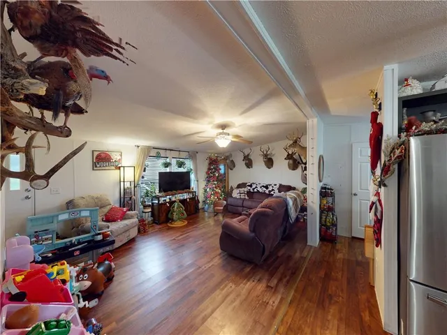 a living room filled with furniture and a couch