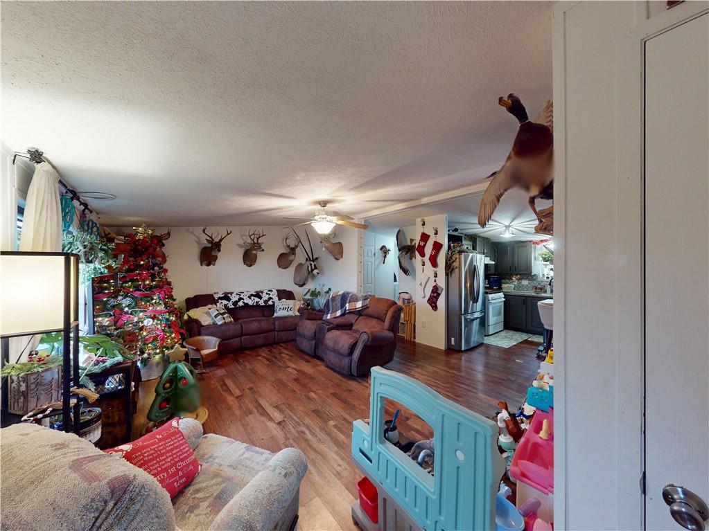 145 Boomerang Road Harrisville, PA 16038 - Photo 10 of 37 a living room filled with furniture and a couch