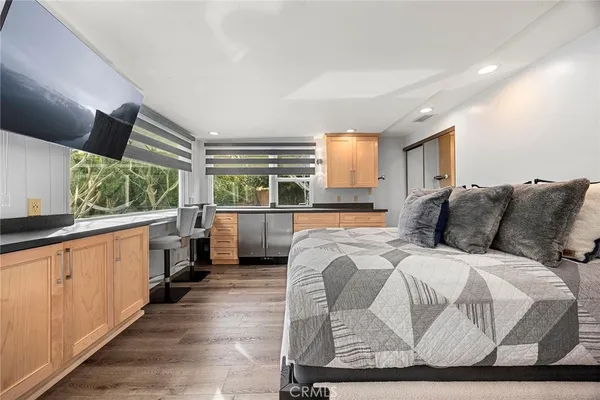 a bed room with a bed and a window