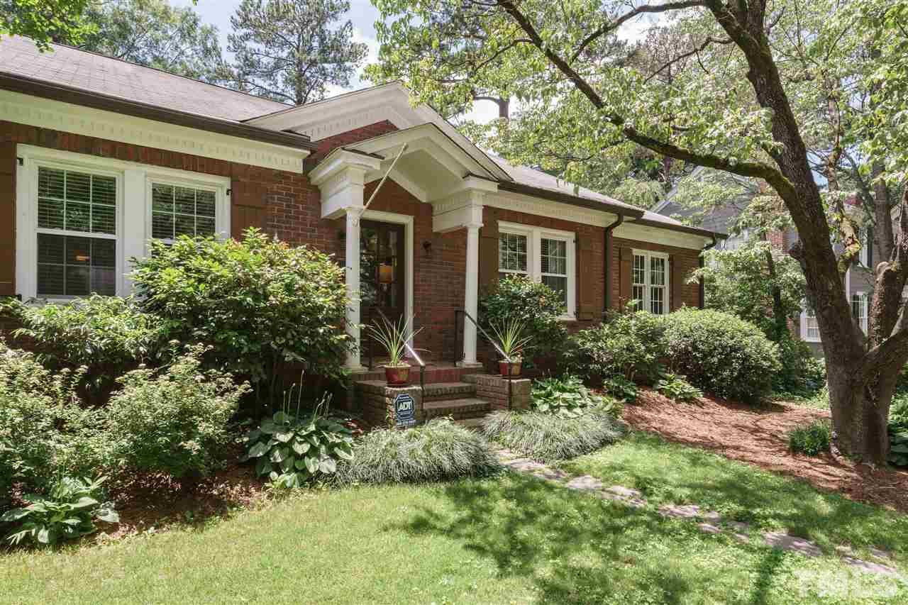 2237 The Circle Raleigh, NC 27608 - Photo 2 of 22 a front view of a house with a yard