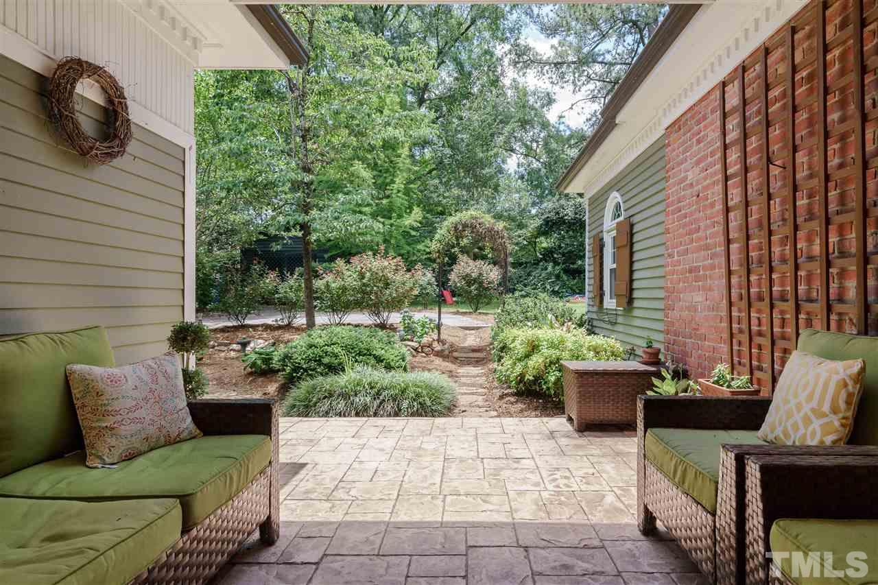2237 The Circle Raleigh, NC 27608 - Photo 19 of 22 a view of a deck with couches and potted plants