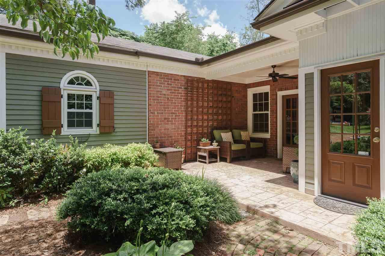 2237 The Circle Raleigh, NC 27608 - Photo 20 of 22 a backyard of a house with seating space