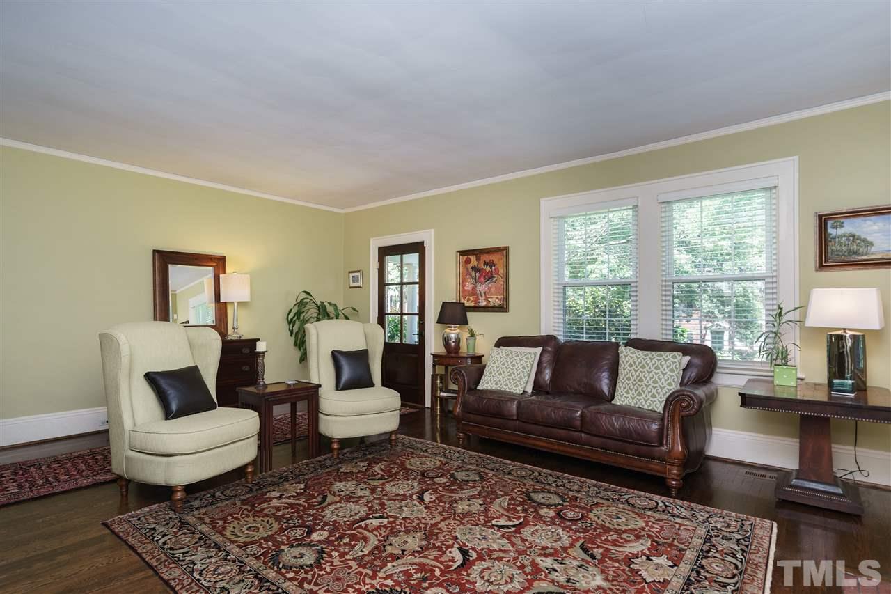 2237 The Circle Raleigh, NC 27608 - Photo 3 of 22 a living room with furniture and a rug