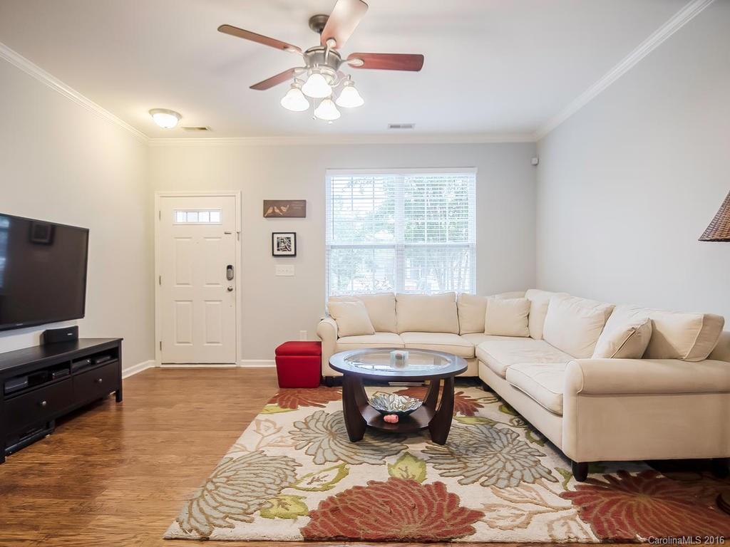 108 Chimney Rock Lane, Unit 16 Fort Mill, SC 29708 - Photo 3 of 21 a living room with furniture and a flat screen tv