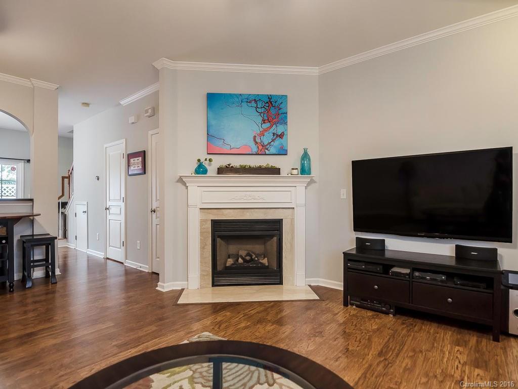 108 Chimney Rock Lane, Unit 16 Fort Mill, SC 29708 - Photo 4 of 21 a living room with furniture and a flat screen tv