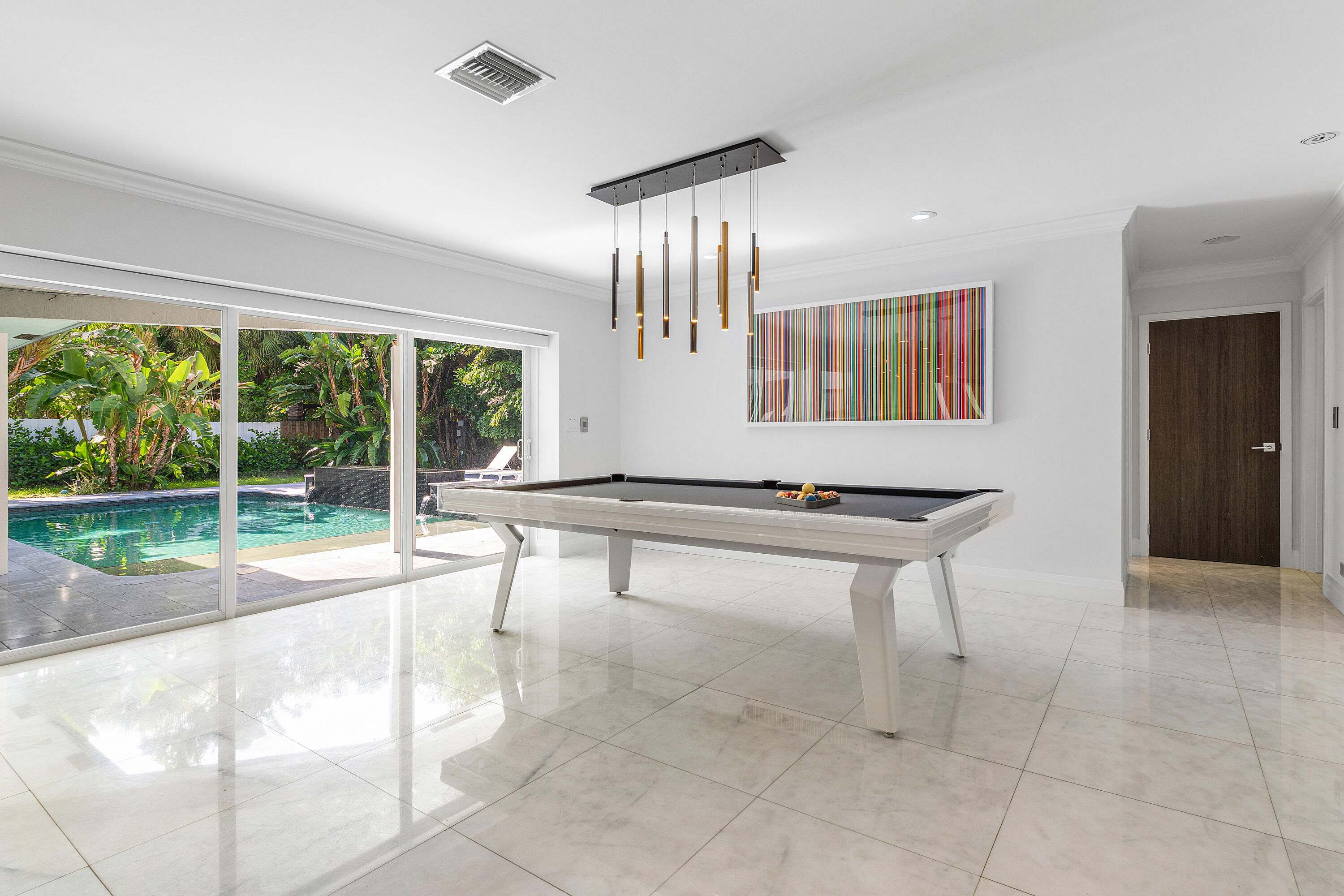 960 Southwest 18th Street Boca Raton, FL 33486 - Photo 12 of 40 a room with pool table and windows