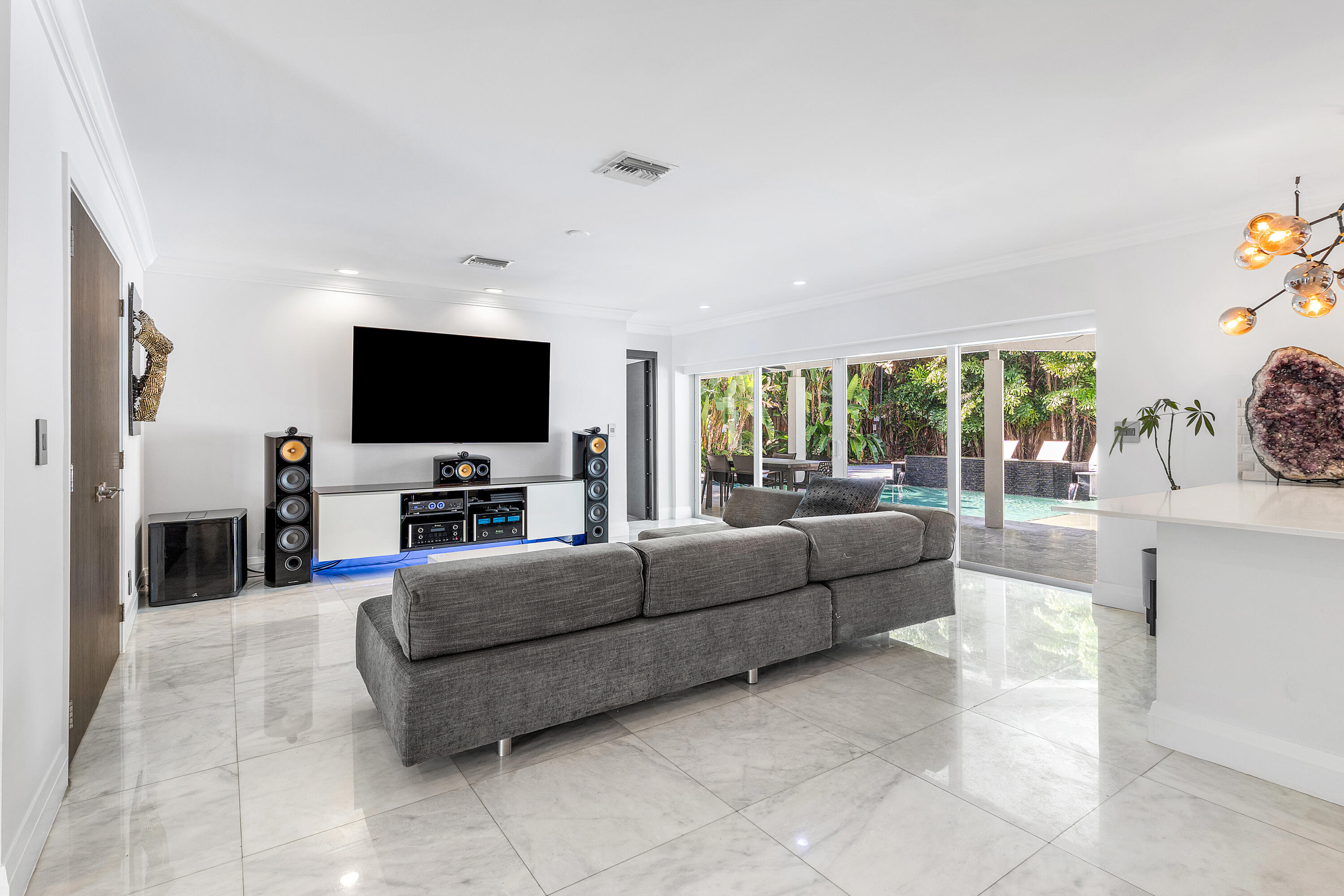 960 Southwest 18th Street Boca Raton, FL 33486 - Photo 14 of 40 a living room with furniture and a flat screen tv