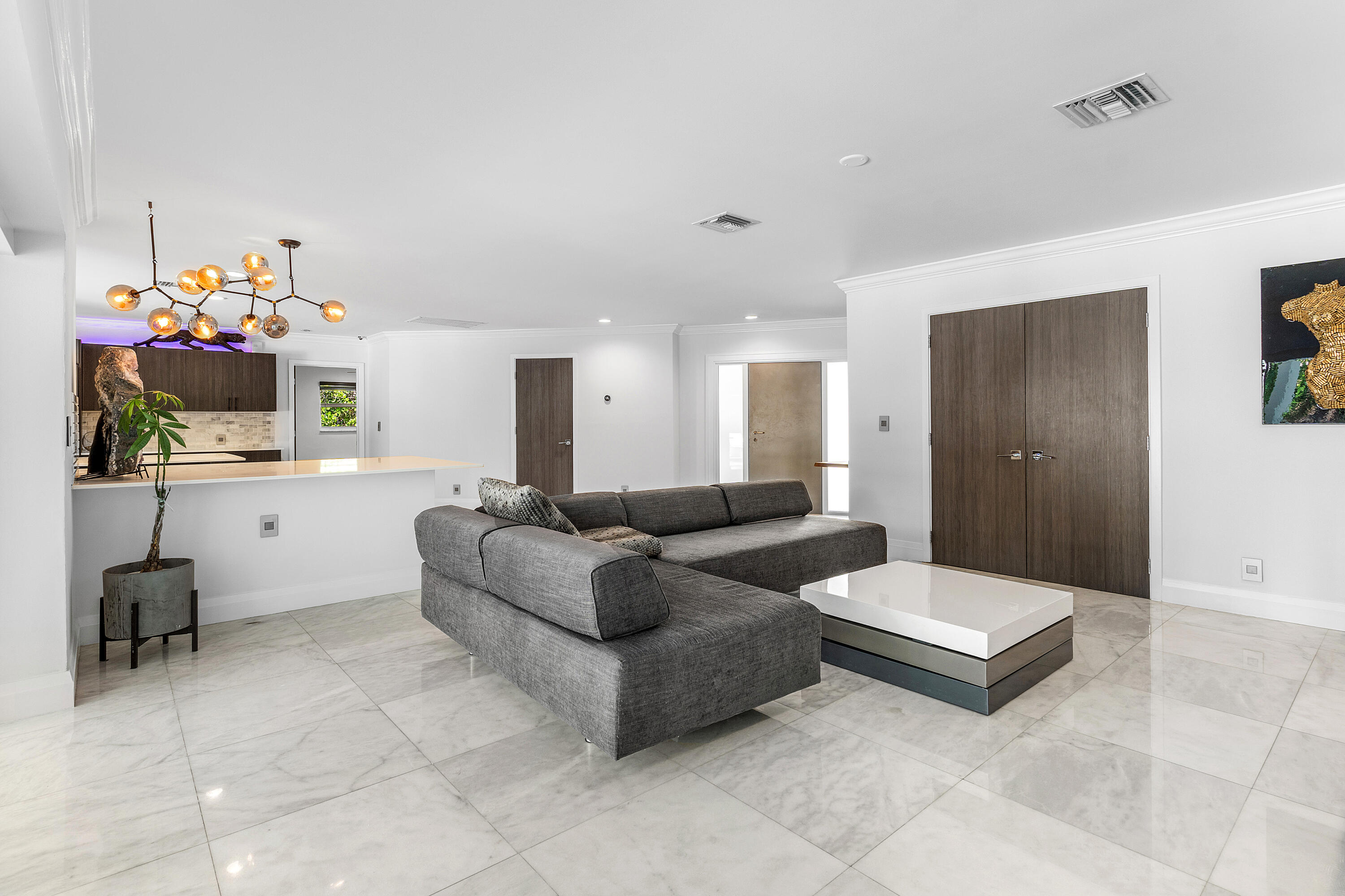 960 Southwest 18th Street Boca Raton, FL 33486 - Photo 15 of 40 a living room with furniture and a flat screen tv
