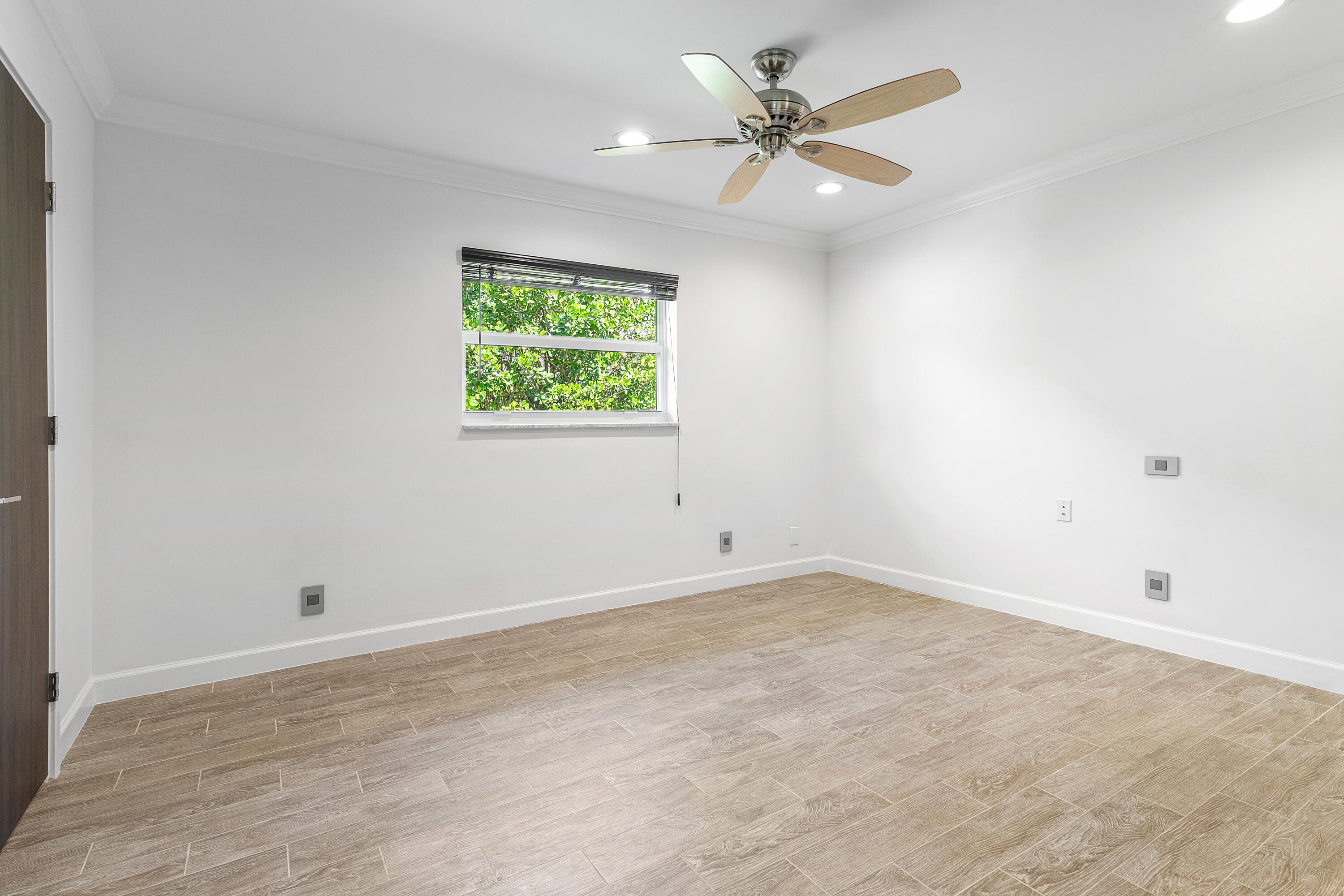 960 Southwest 18th Street Boca Raton, FL 33486 - Photo 30 of 40 a view of an empty room with a window