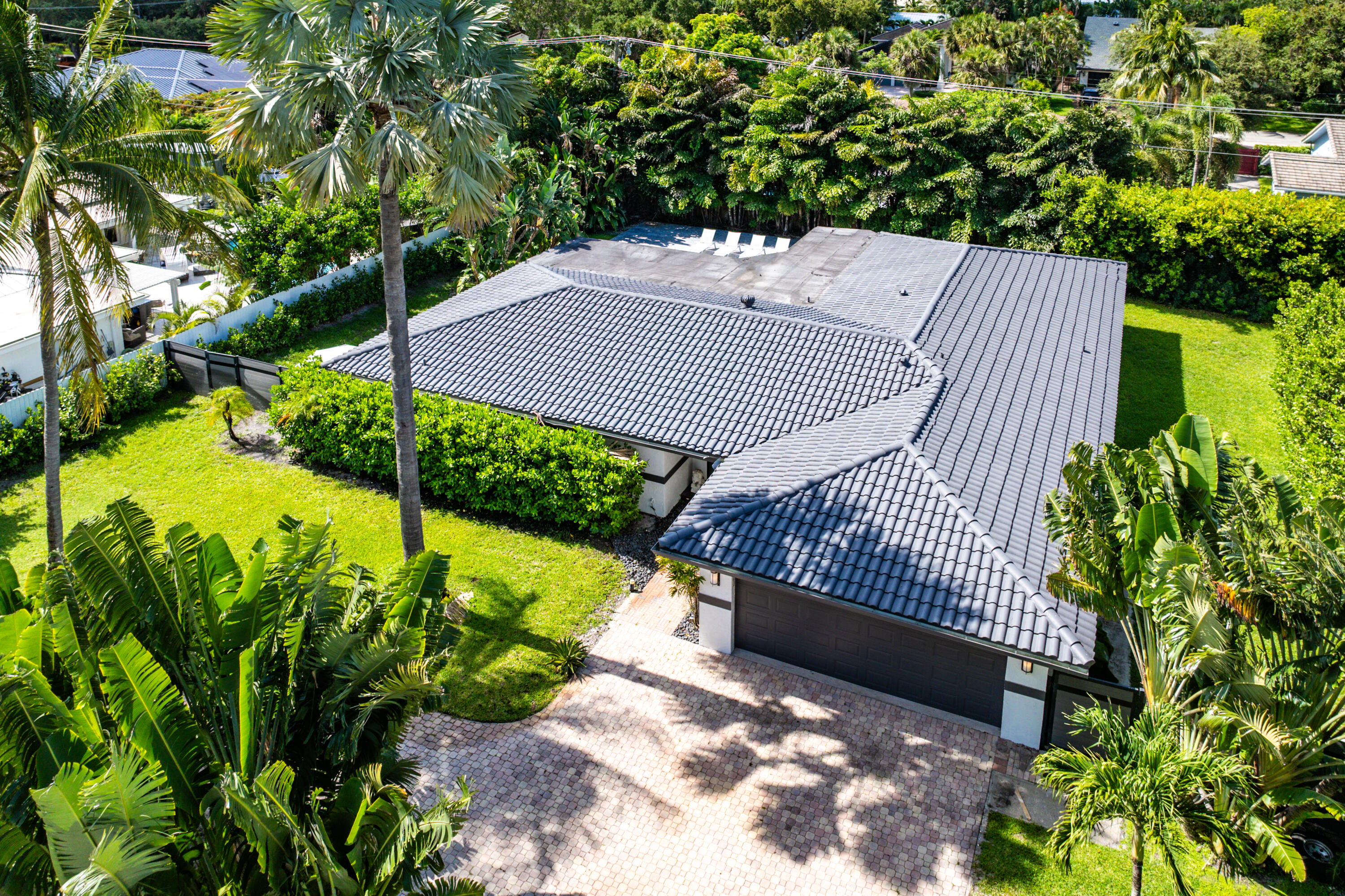 960 Southwest 18th Street Boca Raton, FL 33486 - Photo 3 of 40 a view of an outdoor space and a yard