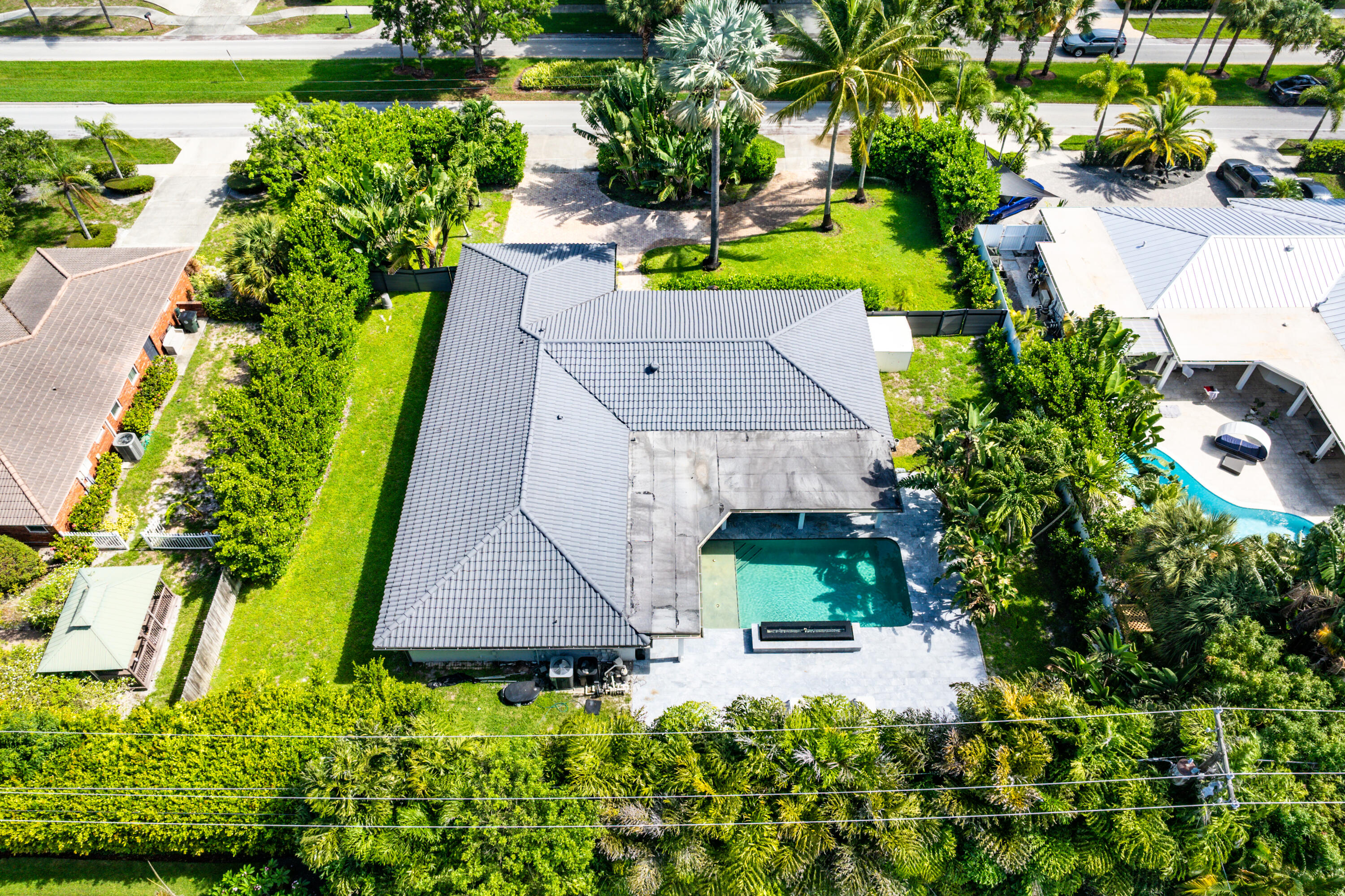 960 Southwest 18th Street Boca Raton, FL 33486 - Photo 38 of 40 an aerial view of a house with a yard and garden