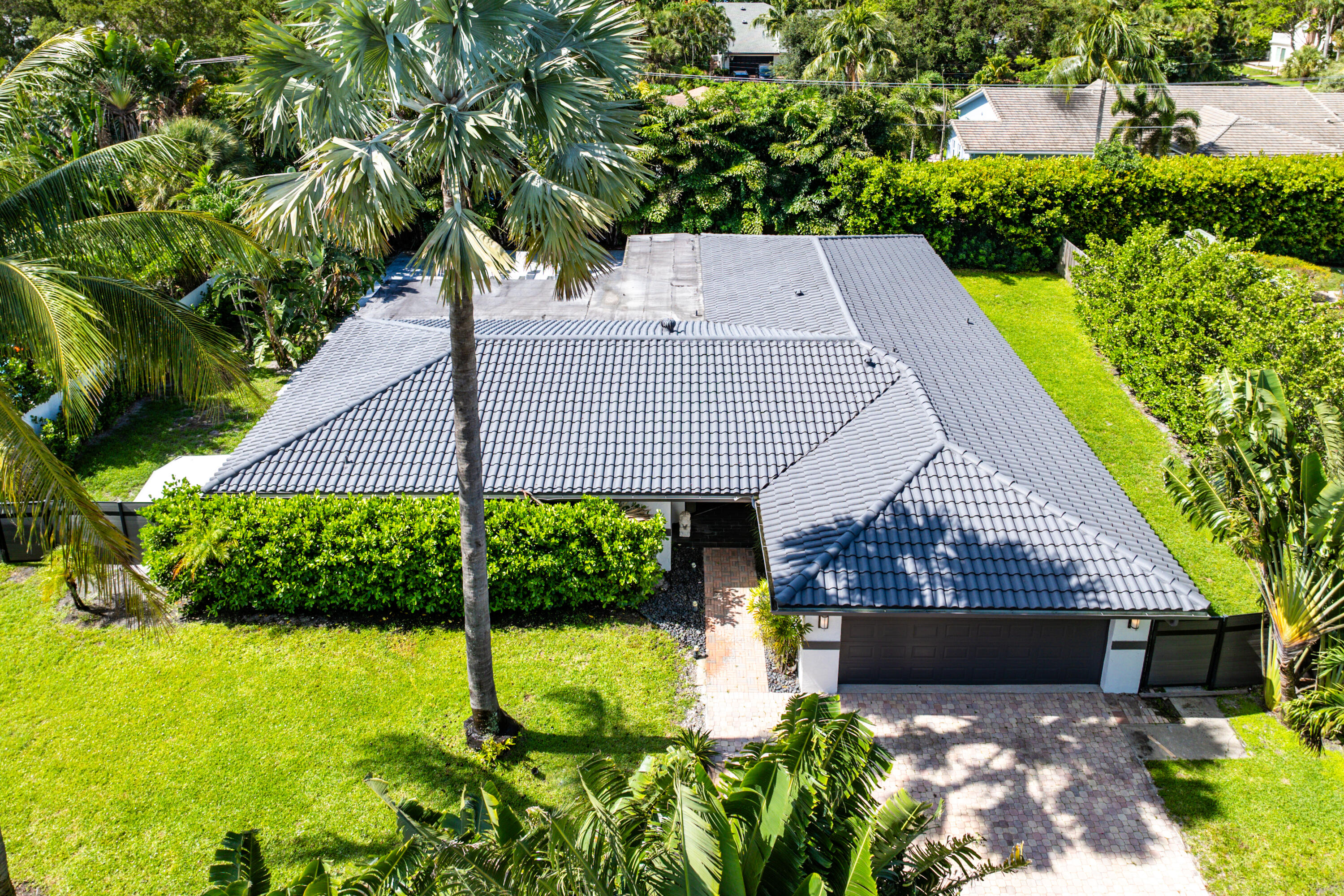 960 Southwest 18th Street Boca Raton, FL 33486 - Photo 5 of 40 a view of a house with a yard