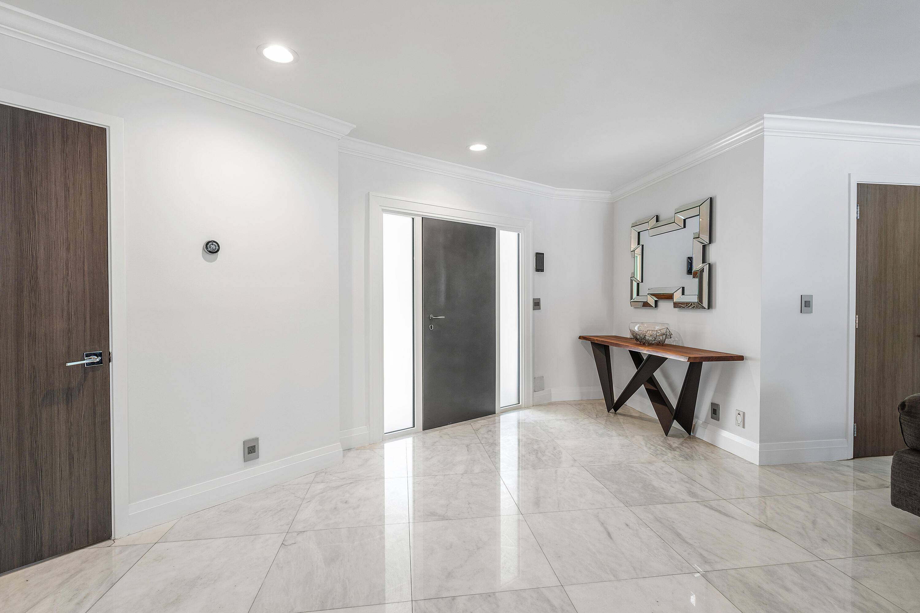 960 Southwest 18th Street Boca Raton, FL 33486 - Photo 7 of 40 a view of an empty room with painting on the wall