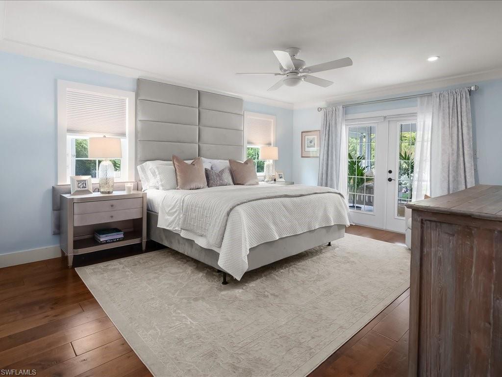 624 Ridge Drive Naples, FL 34108 - Photo 24 of 50 a bed room with a bed and a window