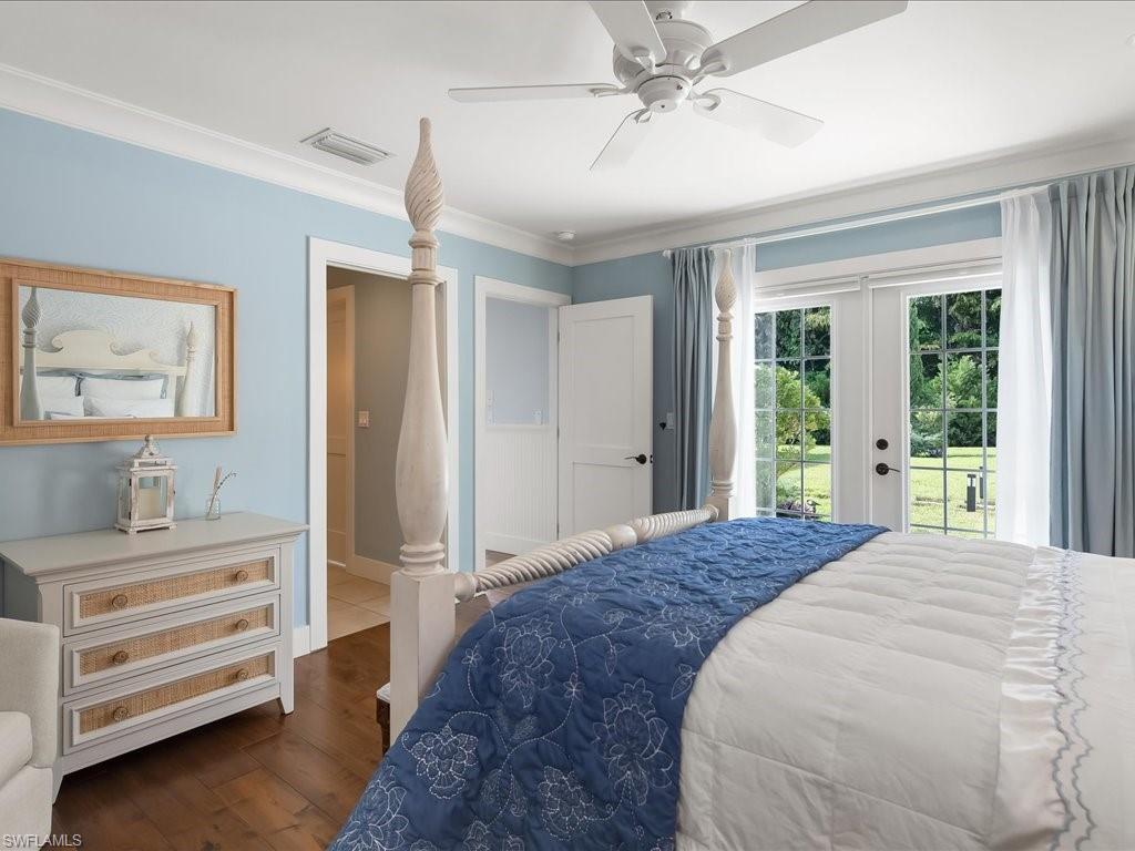 624 Ridge Drive Naples, FL 34108 - Photo 30 of 50 a bed room with a bed and a window