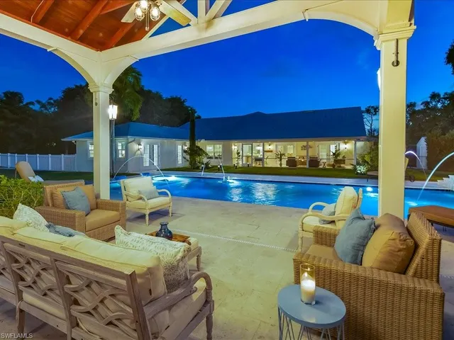 a view of a chairs and tables in the patio