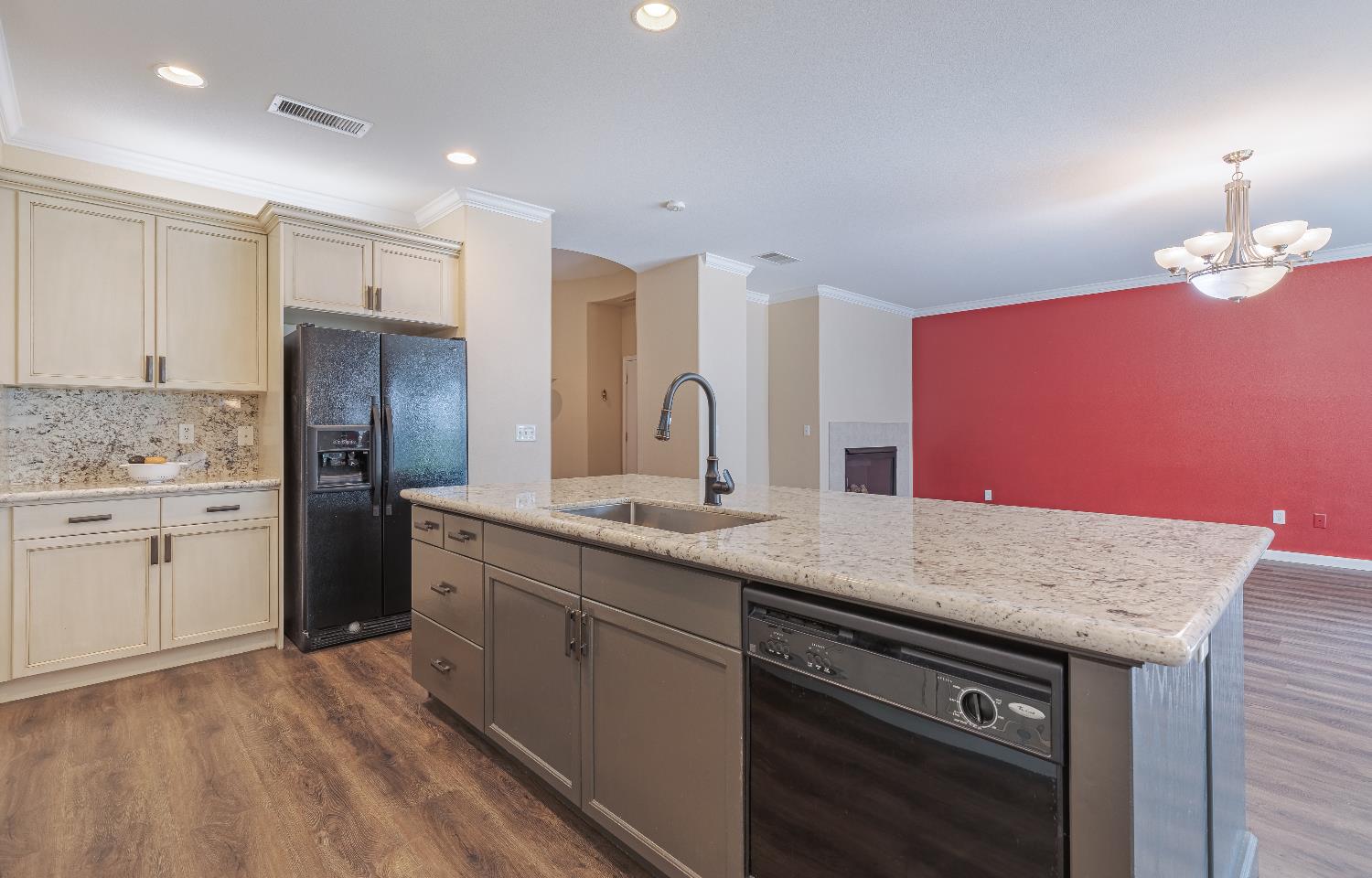2222 Carson Avenue Clovis, CA 93611 - Photo 11 of 41 a kitchen with stainless steel appliances granite countertop a sink stove and refrigerator