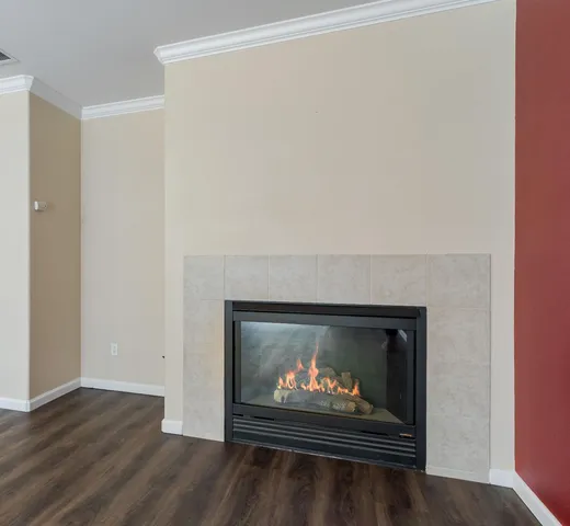 a living room with a fireplace