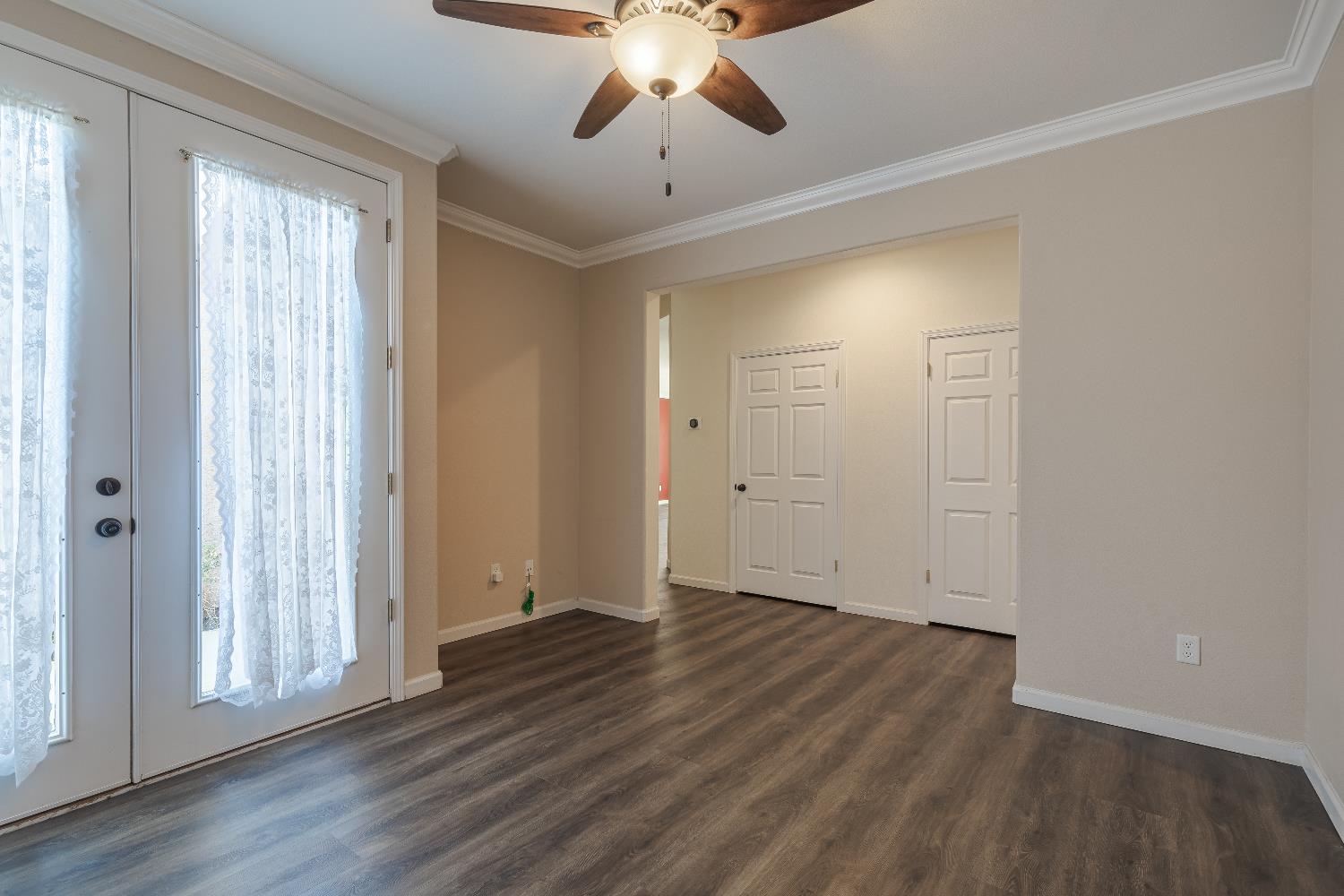2222 Carson Avenue Clovis, CA 93611 - Photo 18 of 41 wooden floor in an empty room with a window