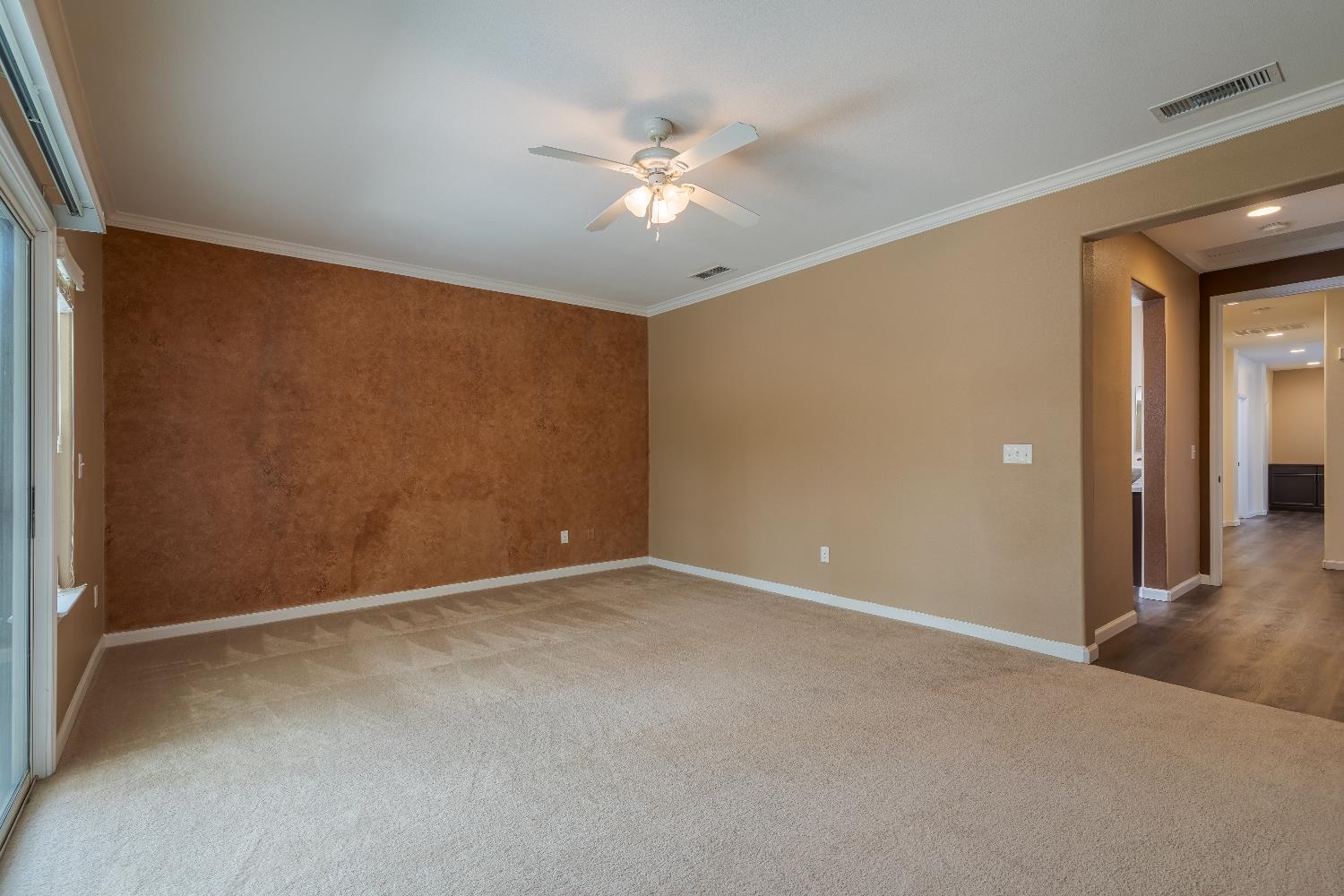 2222 Carson Avenue Clovis, CA 93611 - Photo 20 of 41 a view of an empty room with a ceiling fan