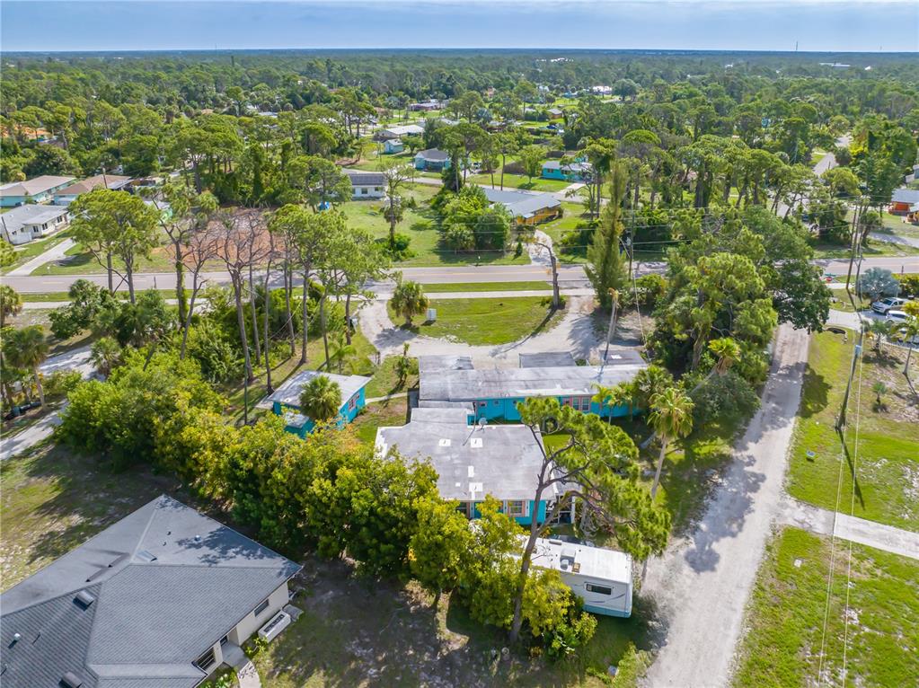 600 Old Englewood Road Englewood, FL 34223 - Photo 5 of 7 an aerial view of residential houses with outdoor space