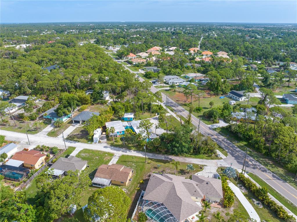 600 Old Englewood Road Englewood, FL 34223 - Photo 6 of 7 an aerial view of residential houses with outdoor space and trees