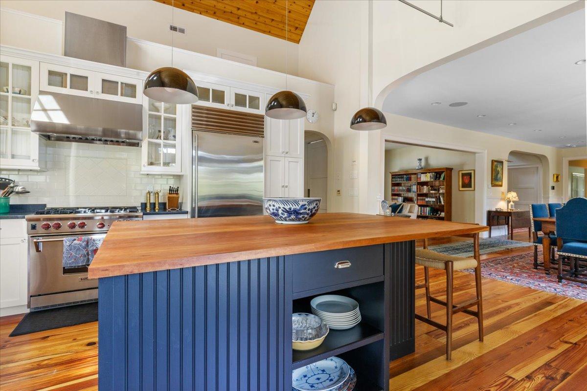 58 Slough Pond Road Truro, MA 02666 - Photo 12 of 82 a kitchen with stainless steel appliances granite countertop a stove and cabinets
