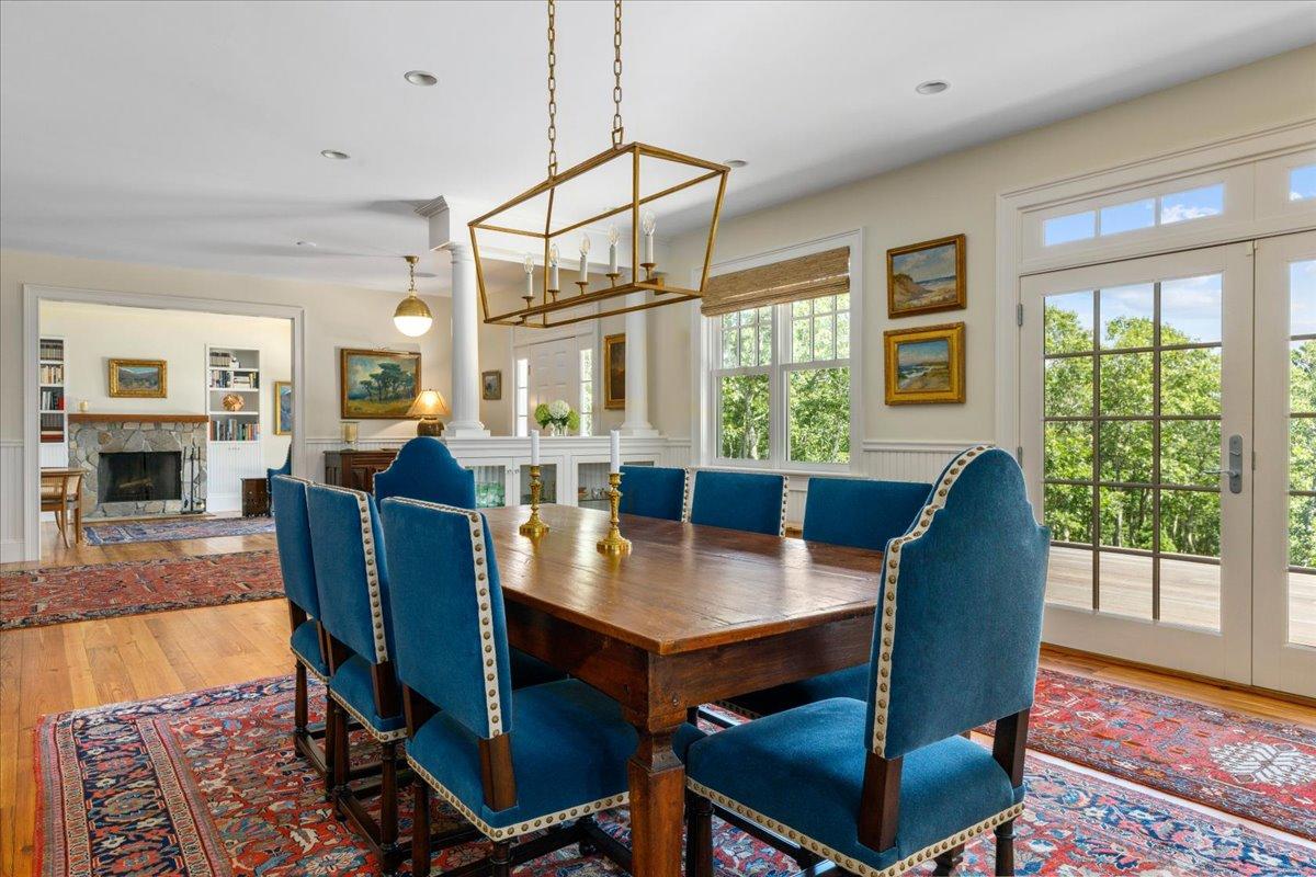 58 Slough Pond Road Truro, MA 02666 - Photo 14 of 82 a view of a dining room with furniture window and wooden floor