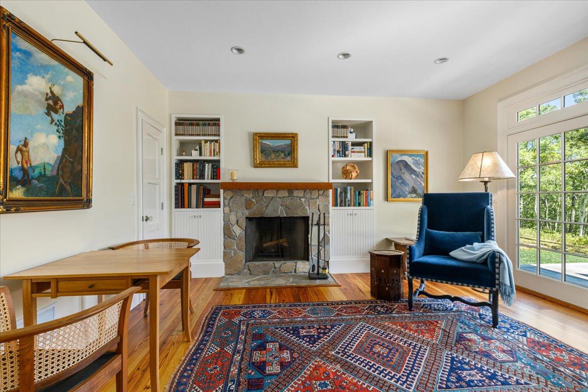 58 Slough Pond Road Truro, MA 02666 - Photo 19 of 82 a living room with furniture and a fireplace