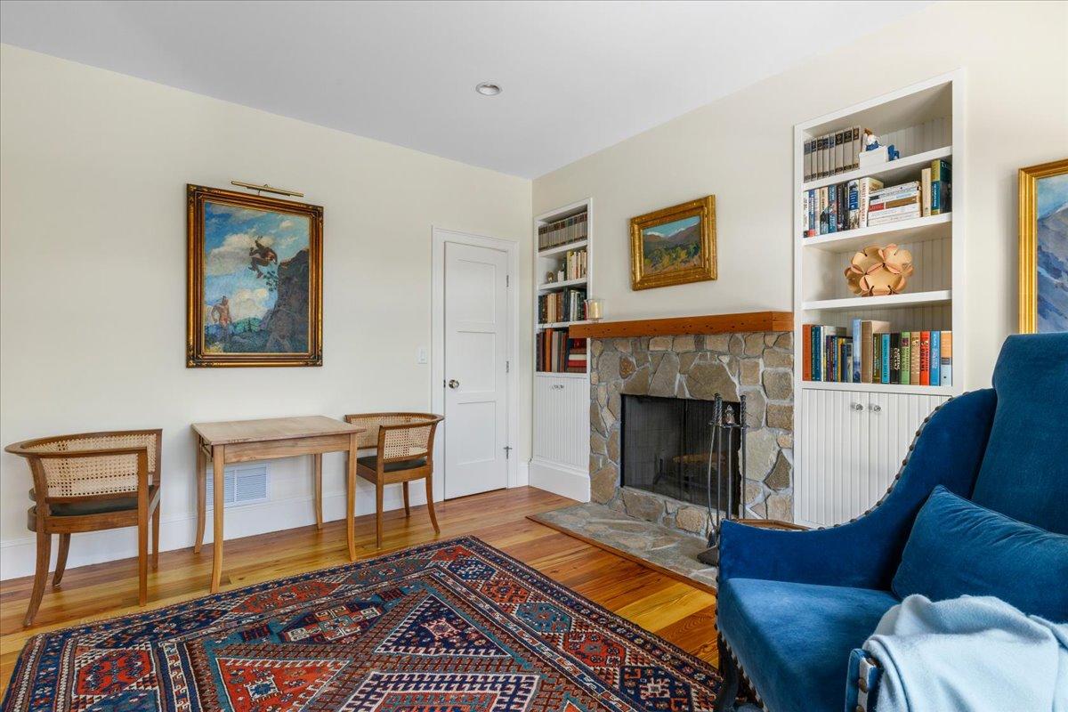 58 Slough Pond Road Truro, MA 02666 - Photo 20 of 82 a living room with furniture and a fireplace