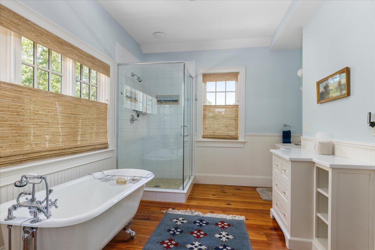 58 Slough Pond Road Truro, MA 02666 - Photo 26 of 82 a bathroom with a tub sink and a window