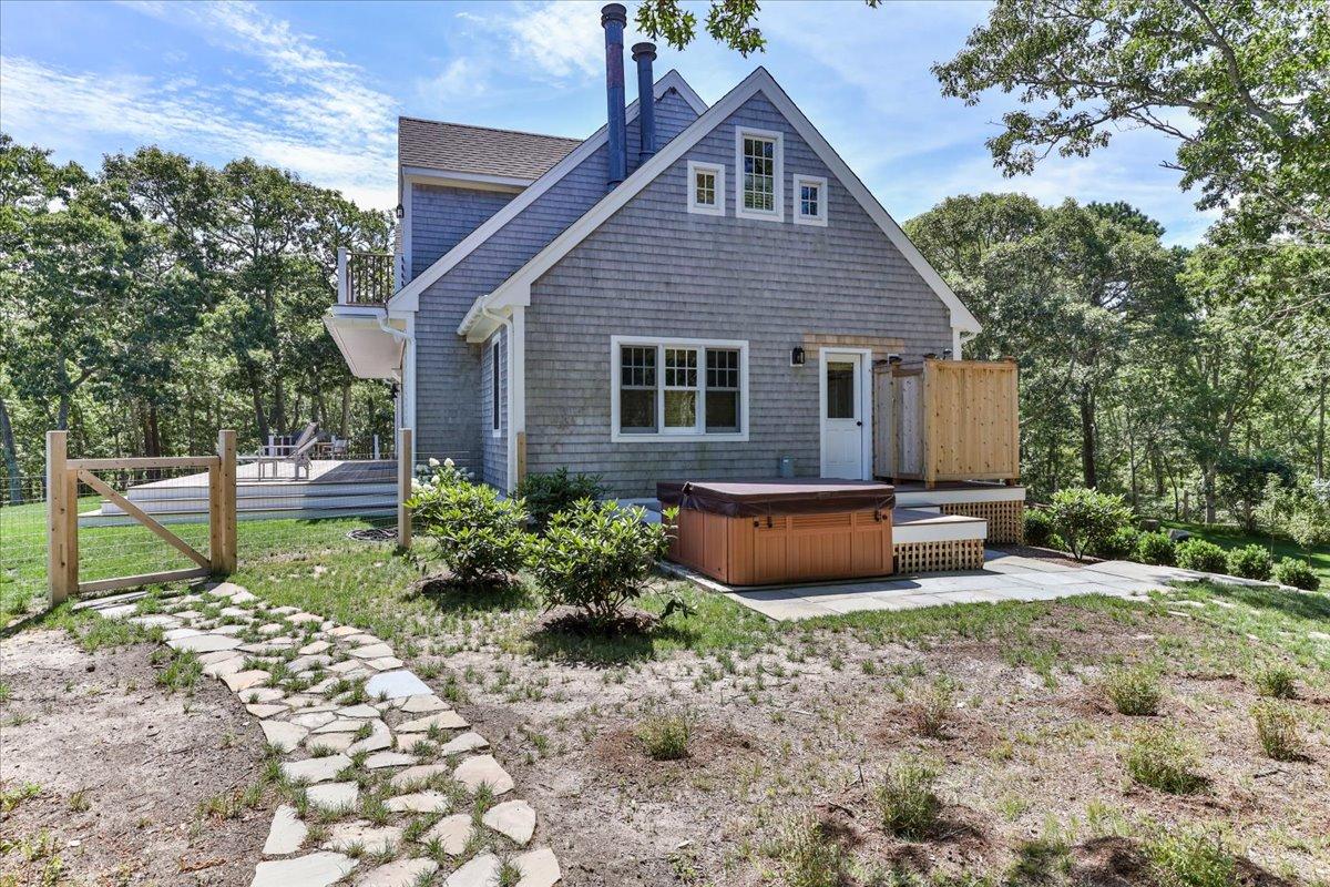 58 Slough Pond Road Truro, MA 02666 - Photo 61 of 82 a view of a house with backyard and sitting area