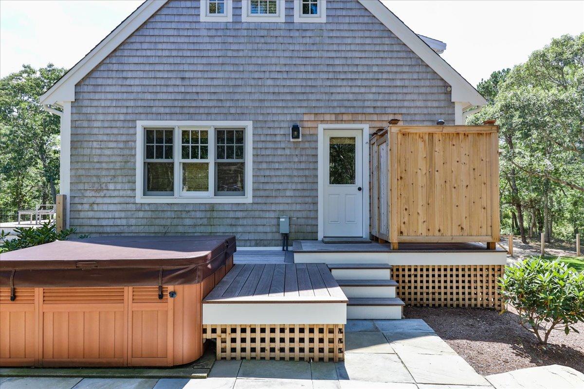 58 Slough Pond Road Truro, MA 02666 - Photo 64 of 82 a front view of a house with a garden