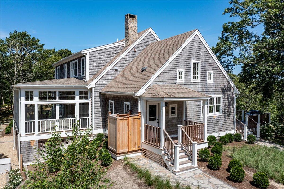 58 Slough Pond Road Truro, MA 02666 - Photo 69 of 82 a front view of a house with a yard